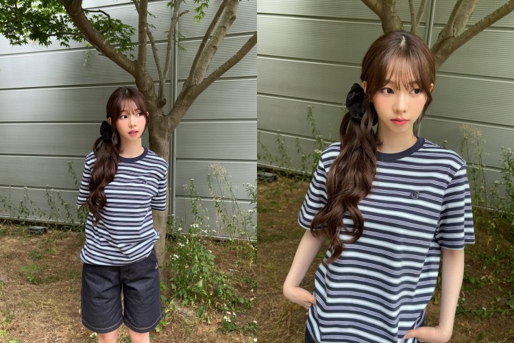 這套造型展現Karina休閒卻精緻的穿搭風格，簡單的條紋T恤，搭配同色系牛仔五分褲，營造乾淨的日常氛圍。