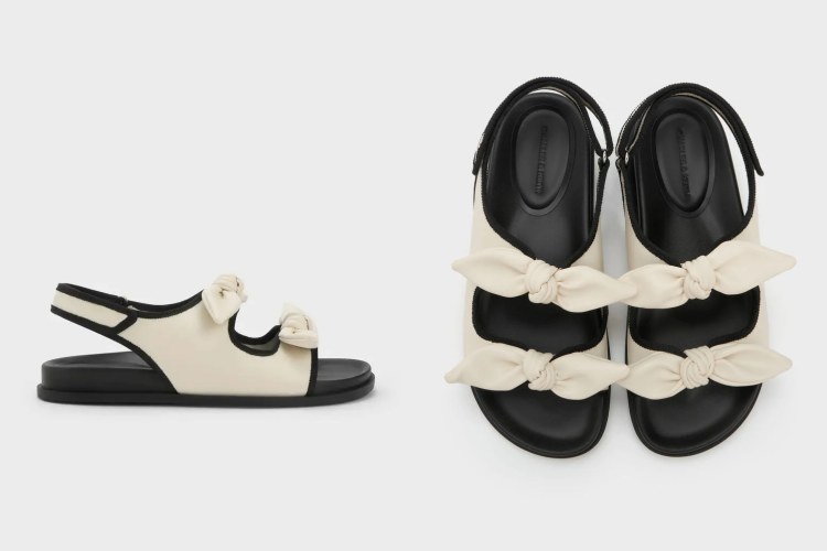 小CK白色綁結平底涼鞋，商品價格 NTD 1,990。