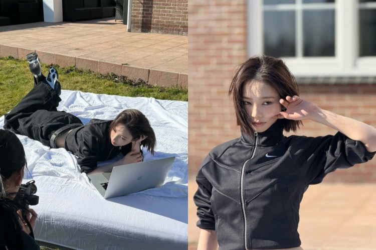 Karina 在這套造型中展現了極簡卻充滿張力的街頭氣場，Nike短版拉鍊運動上衣勾勒出俐落線條，露出纖細腰部，讓整體比例更加修長。