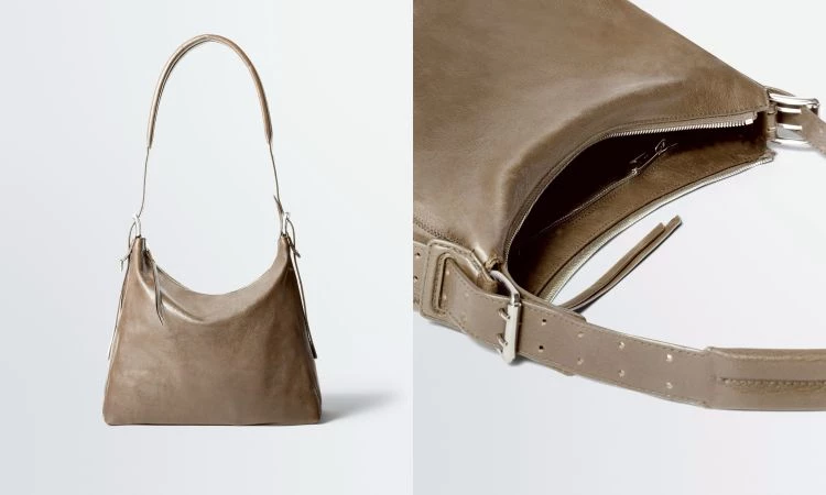 如果喜歡低調卻有設計感的包款，Belted Small Hobo很值得注意。這個系列的標誌細節，是靈感來自腰帶的植鞣皮革背帶，搭配金屬扣件點綴，在極簡外型中帶出剛剛好的對比層次。2026春夏版本選用柔軟的Paper Lux皮革製作，皮面帶著自然光澤，讓包型看起來更俐落也更輕盈。弧形Hobo輪廓貼合身形，容量也比想像中實用，日常出門或通勤都能輕鬆搭配。